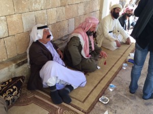 Elders sitting at entry to Lalish Temple - pick the century.