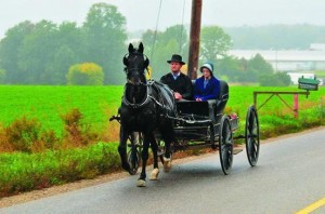 Amish couple riding in style